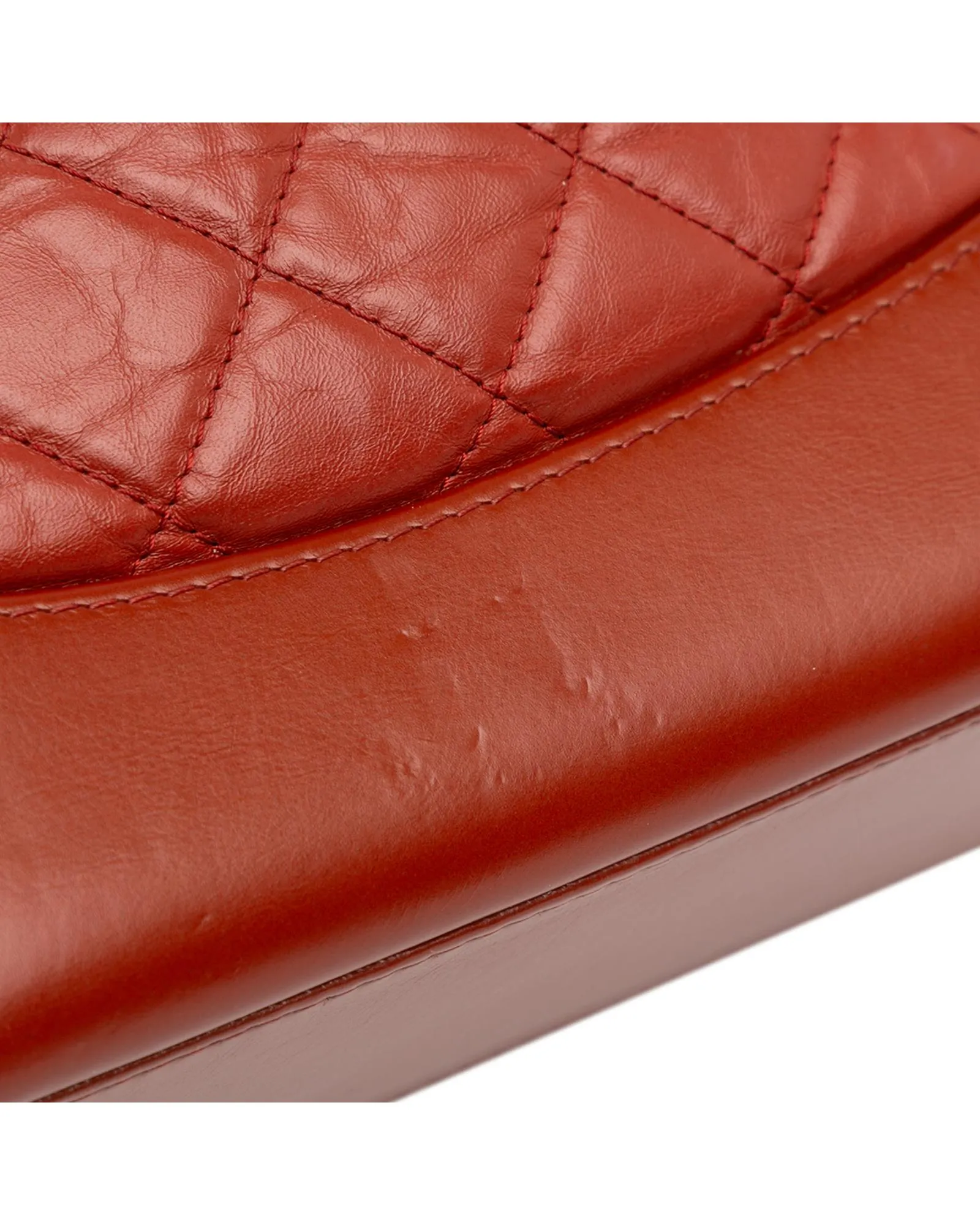 Aged Calfskin Leather Backpack with Chain Straps and Drawstring Closure